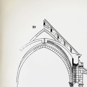 May include: A black and white line drawing of a cross-section of an archway, labeled "29", showing the structural details of the stonework.