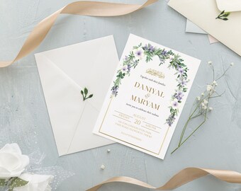 Puede incluir: Una invitación de boda blanca con un borde dorado y un diseño floral. La invitación dice "Junto con sus familias, Daniyal & Maryam les invitan a celebrar su unión. Viernes, 20 de agosto, 6:00 PM.  [Ubicación]"