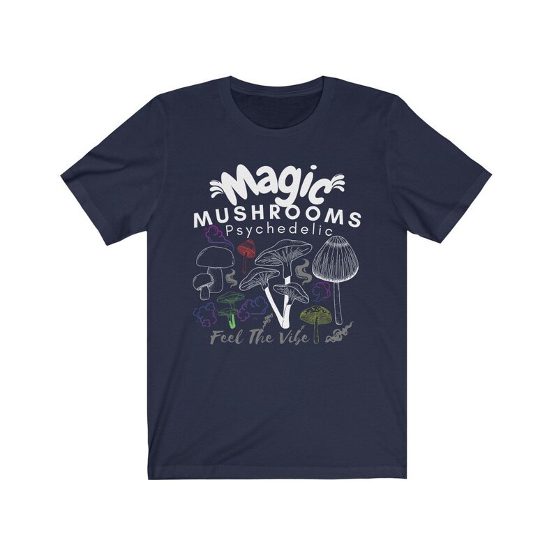 May include: A navy blue t-shirt with a white graphic of mushrooms and the text "Magic Mushrooms Psychedelic Feel The Vibe".