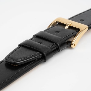 Correa de reloj extra larga con costuras lisas negras