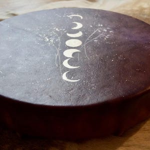 Purple Horse Hide Moon Drum: Shamanic Healing Instrument with White Flowers