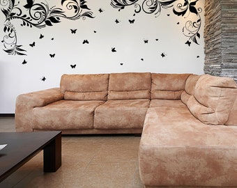 Vinilo decorativo de flores en forma de remolino: arte de pared con acento de mariposa