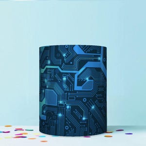 May include: A cylindrical mug featuring a dark blue and black printed pattern of interconnected electronic circuit board lines and nodes. The design includes glowing light blue accents that highlight the intricate pathways across the surface.
