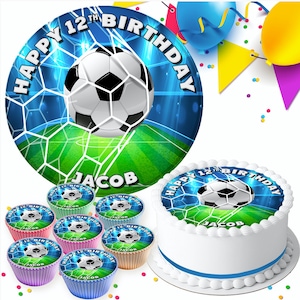 May include: A round cake with a blue and green soccer ball design. The cake is decorated with the words "Happy 12th Birthday Jacob". There are also six smaller cupcakes with the same design.