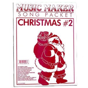 May include: A red and white cover for a music song packet titled "Music Maker Song Packet Christmas #2". The cover features a cartoon image of Santa Claus carrying a bag of gifts.