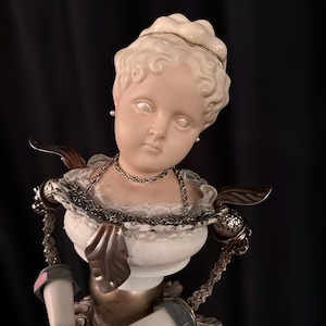 May include: A set of three ceramic nesting bowls in shades of blue, green, and white. The bowls feature a speckled glaze and a simple, modern design. The largest bowl measures approximately 6 inches in diameter.