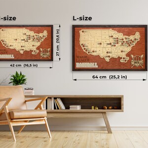 May include: A wooden map of the United States with the locations of Major League Baseball teams marked. The map is framed in dark wood and has the text "Major League Baseball" and "Smith Family" printed on it. The map is available in two sizes: 16.5 inches by 10.6 inches and 25.2 inches by 16.2 inches.