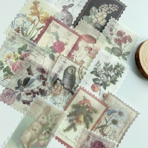 May include: A collection of vintage-style postage stamps with floral, animal, and botanical illustrations. The stamps feature images of roses, rabbits, owls, and butterflies, with numbers and text. The stamps have a scalloped edge and a faded, antique appearance.