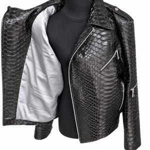 Black genuine python snakeskin leather biker jacket open showing satin lining