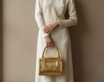 Borsa a mano di lusso in vera pelle di pitone color oro