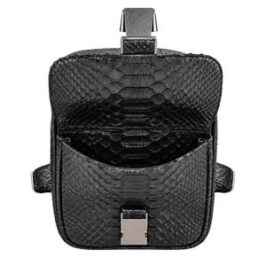 Rear view of black python snakeskin backpack showing back panel and adjustable strap construction