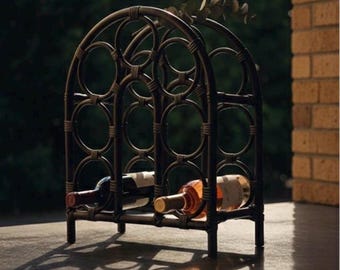 Stunning Vintage Black Rattan 7-Bottle Wine Rack