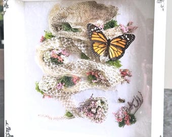 Eastern Coastal Python serpentine shed & Monarch Butterfly