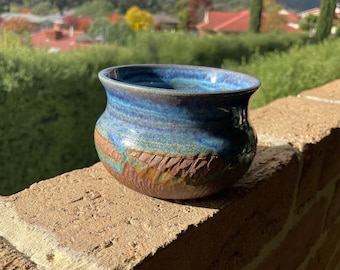 Stunningly detailed pottery dip bowl with textured glaze.