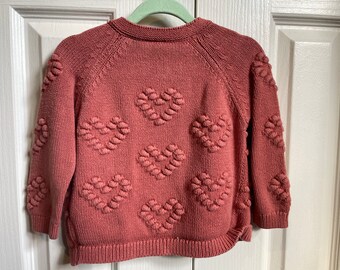 Absolutely darling cranberry cardigan.