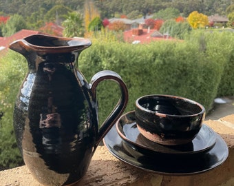 Black & brown pottery set.