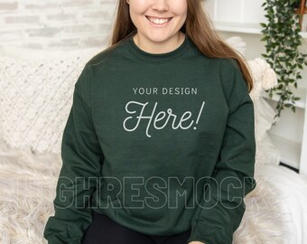 May include: A dark green sweatshirt with the text "YOUR DESIGN Here!" printed on the front.