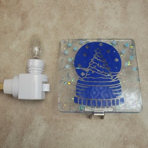 Christmas plug in nightlight. Hand-poured resin. Winter decor. Holiday decoration. Yule. Beautiful gift. Sparkly. Snowflakes