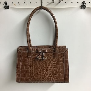 Monedero Liz Claiborne con estampado de serpiente falsa España