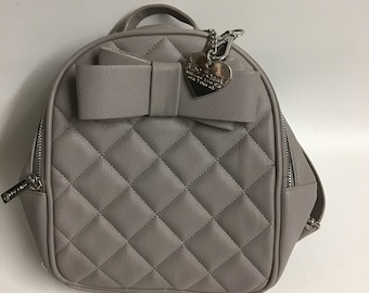 can men wear mini backpacks Men Wearing Mini Backpacks