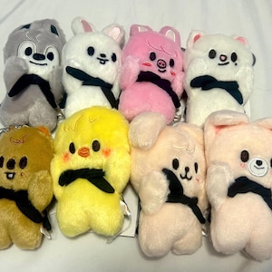 Official skzoo merch (skzoo tamagotchi, skz 5’clock, dominate)