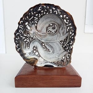 Carved black mother of pearl dragon carving, real and natural sea shell