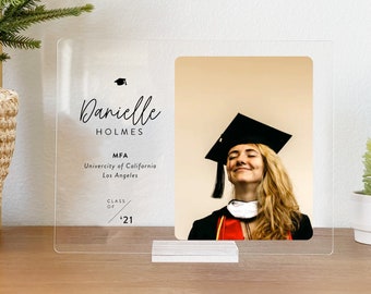 A custom plaque made from an acrylic material that has your daughter graduation photo, her name, and graduation date engraved is the most perfect gift for your daughter 