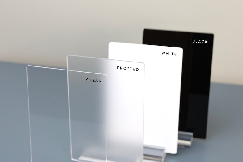 May include: Four acrylic sheets in different finishes: clear, frosted, white, and black. Each sheet has its finish name printed on it.