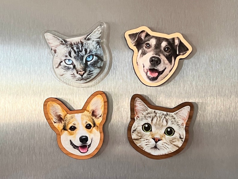 Custom face-shaped photo magnets. Featuring cutout designs of pet and baby faces. Perfect for decorating refrigerators, lockers, or any magnetic surface.