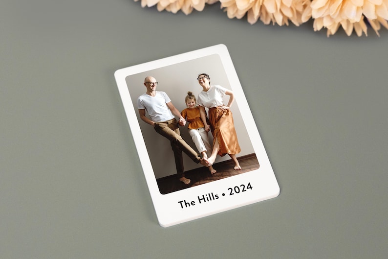 Personalized photo strip magnets featuring custom images and text. These high-quality, durable magnets are perfect for displaying cherished memories on refrigerators, lockers, or any magnetic surface.