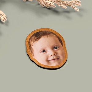 Custom face-shaped photo magnets. Featuring cutout designs of pet and baby faces. Perfect for decorating refrigerators, lockers, or any magnetic surface.
