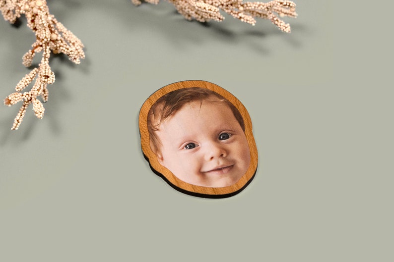 Custom face-shaped photo magnets. Featuring cutout designs of pet and baby faces. Perfect for decorating refrigerators, lockers, or any magnetic surface.