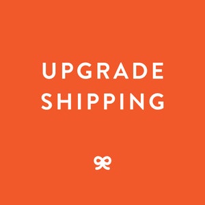 May include: Orange background with white text that reads "Upgrade Shipping" and a white ribbon symbol.