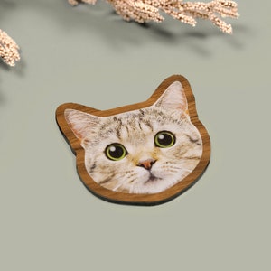 Custom face-shaped photo magnets. Featuring cutout designs of pet and baby faces. Perfect for decorating refrigerators, lockers, or any magnetic surface.