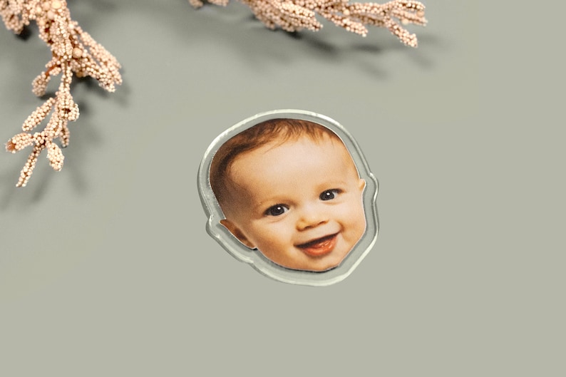 Custom face-shaped photo magnets. Featuring cutout designs of pet and baby faces. Perfect for decorating refrigerators, lockers, or any magnetic surface.