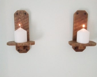 A pair of candle sconces. Please read p&p restrictions on this order under description.