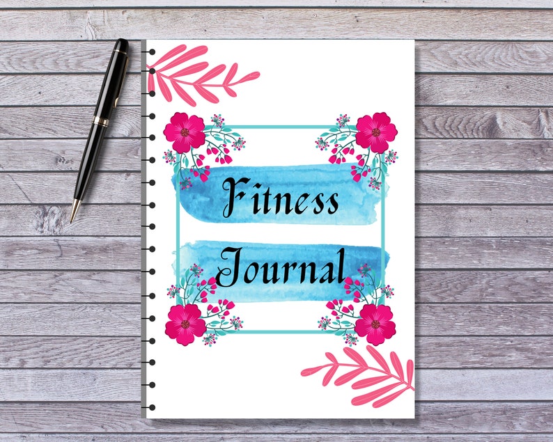 May include: A white spiral bound journal with a blue and teal watercolor design. The journal has the words "Fitness Journal" written in black. The cover is decorated with pink flowers and leaves.
