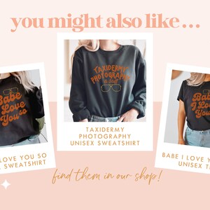 May include: Image featuring three dark-colored sweatshirts and a tee shirt with retro-style text. The sweatshirts and tee shirt have the phrases "Babe I Love You So" and "Taxidermy Photography & Stuff" printed on them. The image also includes the text "you might also like..." and "find them in our shop!"
