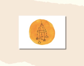 May include: A black and white line drawing of a baby mobile with stars, clouds, and a crescent moon hanging from a circular frame. The mobile is set against a watercolor background of a yellow circle.