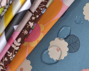 Tela Oxford impermeable, resistente a la lluvia y al aceite.