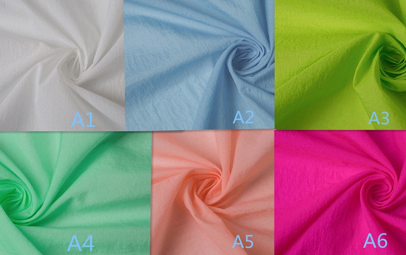 K&ouml;nnte beinhalten: Sechs Stoffmuster in verschiedenen Farben: Wei&szlig;, Hellblau, Limettengr&uuml;n, Hellgr&uuml;n, Pfirsich und Pink. Die Muster sind in zwei Reihen mit jeweils drei Mustern angeordnet, mit den Bezeichnungen A1 bis A6.
