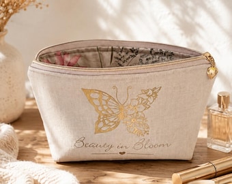 Belleza en flor: neceser de lino con motivo de mariposa.
