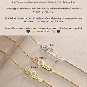 May include: Three gold necklaces with paw print charms and personalized names: Daisy, Oscar, and Olivia. The necklaces are on a white background.
