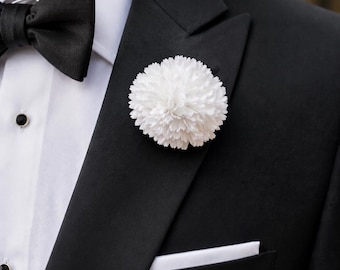 White Carnation lapel pin buttonhole for wedding formal event special occasion.