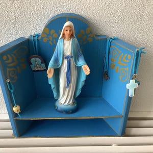 N21 Vintage altar/shrine with religious decorations and Mary