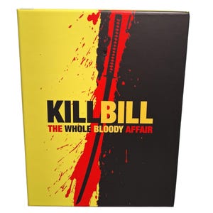 May include: A box with the title "KILL BILL THE WHOLE BLOODY AFFAIR" in black and red text. The box has a yellow background with red splatter and a black background with a red katana sword.