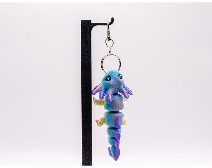 Featured listing image: Cute Articulated Keyring Axolotl flexi stress relief calming sensory creature, desk toy fun stocking filler made with care  in the uk