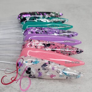 May include: A set of eight nail polishes with different glitter finishes. The polishes are labeled with names like "Black Bikini", "Mojitos & Boots", "Sun's Out, Skulls Out", "Summertime Sadness", "SPF1000", "Flip Flops & Fishnets", "Sun-brella", and "Noir Aesthetic".