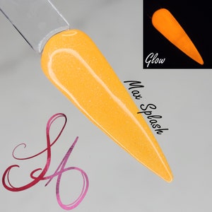 May include: A yellow nail polish with a shimmery finish. The polish glows in the dark. The text "Max Splash" is written on the image.