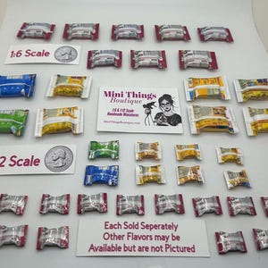 May include: A collection of miniature individually wrapped snack food items in various colors and flavors. The snacks are in 1:6 and 1:12 scale. The image includes the text "Mini Things Boutique 1:6 & 1:12 Scale Handmade Miniatures MiniThingsBoutique.com" and "Each Sold Seperately Other Flavors may be Available but are not Pictured".